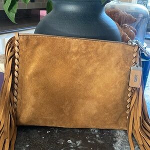 Coach genuine suede clutch fringe excellent condition inside few stains